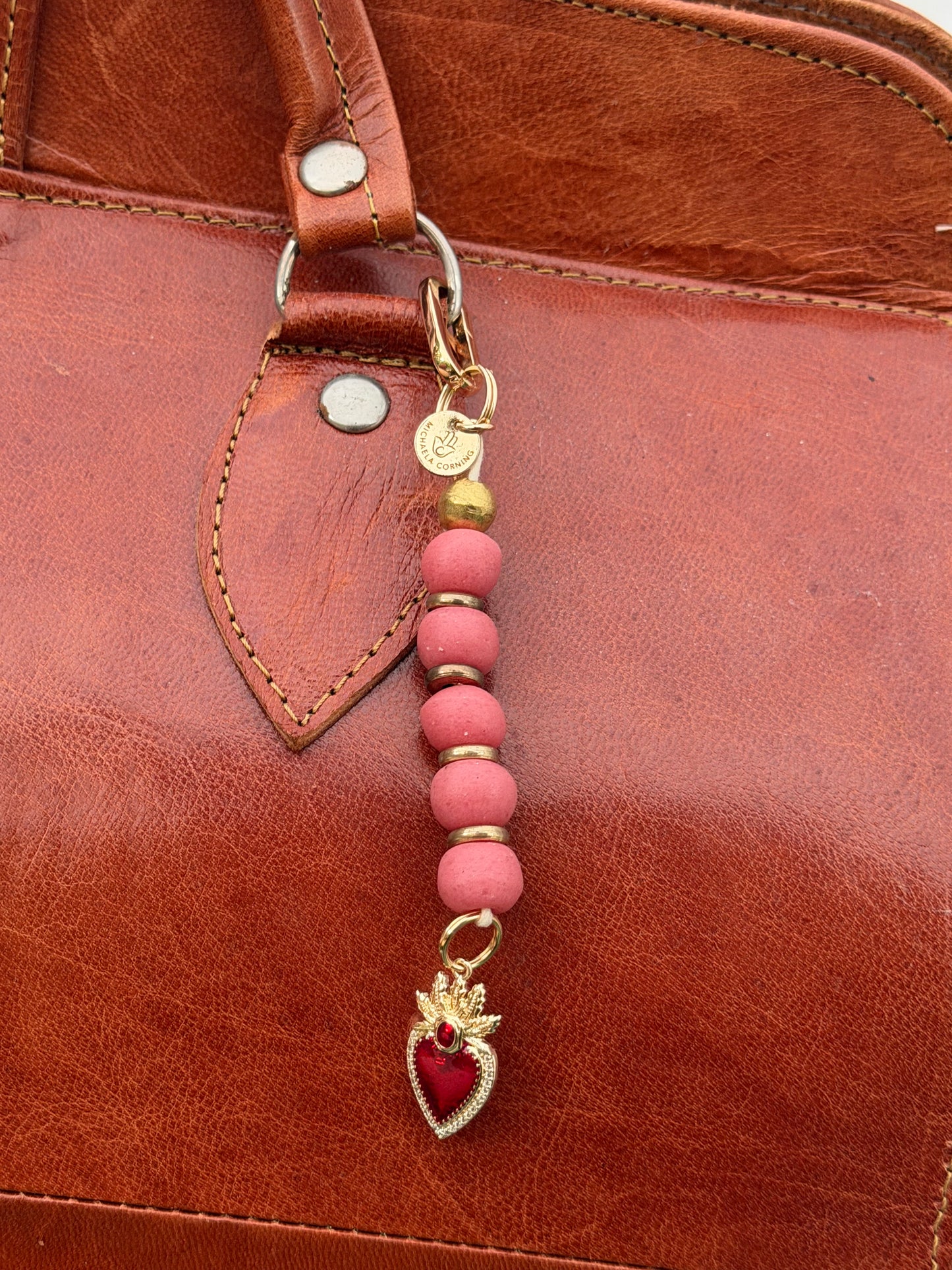 The Love She Carries — Handmade Bag Jewelry