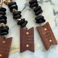 The Roots She Carries — Handmade Bag Jewelry