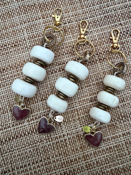 The Tenderness She Carries — Handmade Bag Jewelry