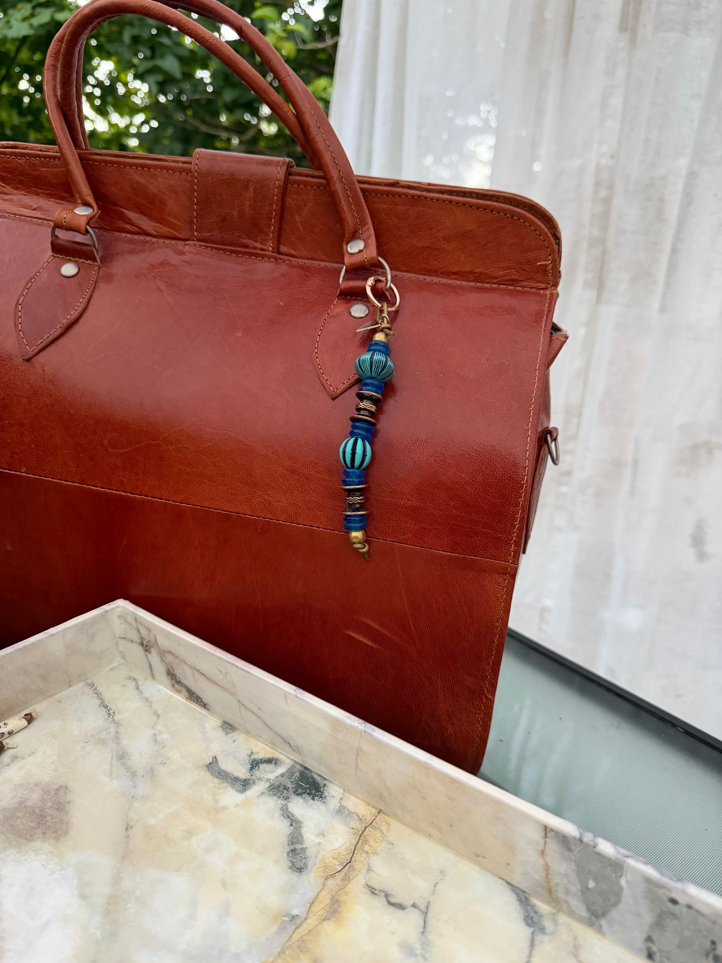 The Depth She Carries — Handmade Bag Jewelry