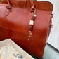 The Protection She Carries — Handmade Bag Jewelry