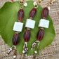 The Protection She Carries — Handmade Bag Jewelry
