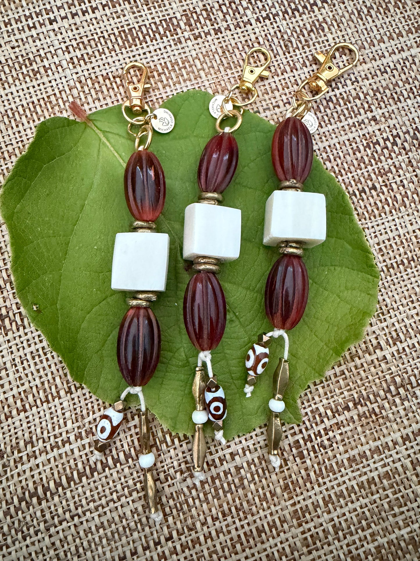 The Protection She Carries — Handmade Bag Jewelry