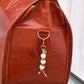 The Quiet She Carries — Handmade Bag Jewelry