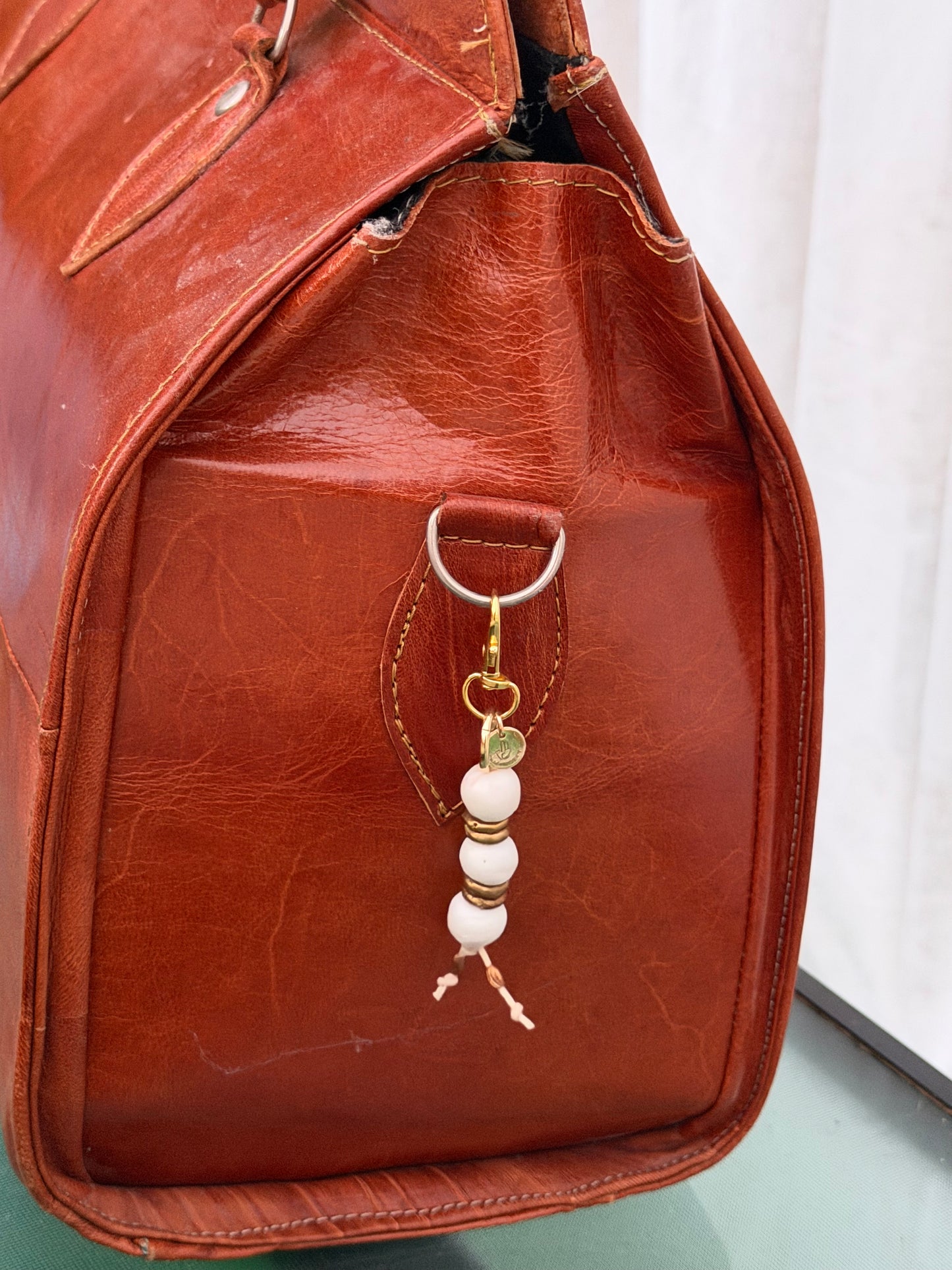The Quiet She Carries — Handmade Bag Jewelry