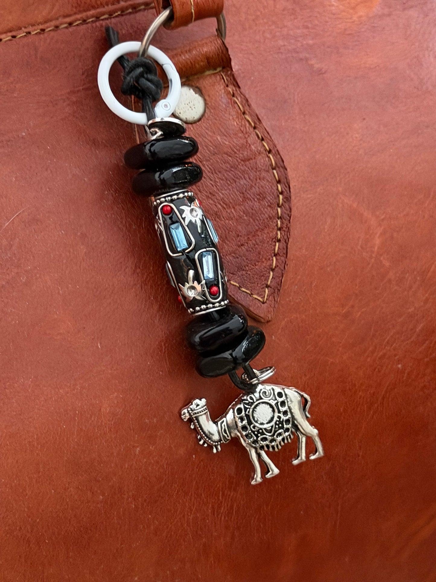 The Strength She Carries — Handmade Bag Jewelry