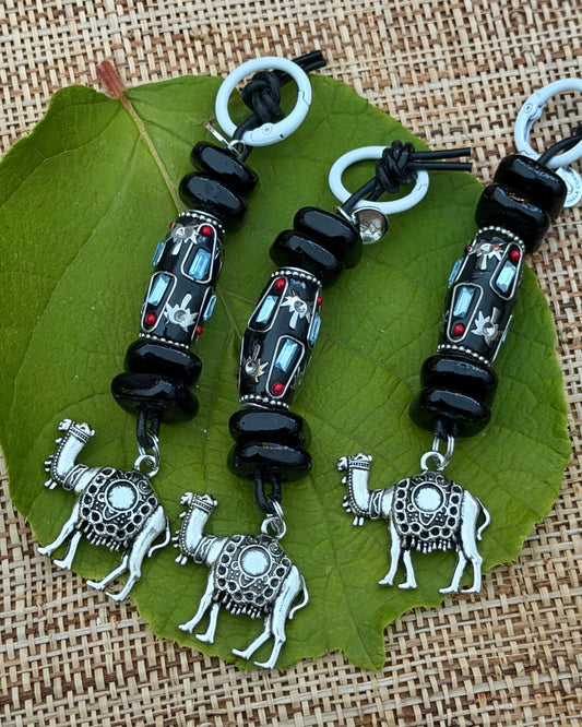 The Strength She Carries — Handmade Bag Jewelry