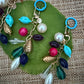 The Joy She Carries — Handmade Bag Jewelry